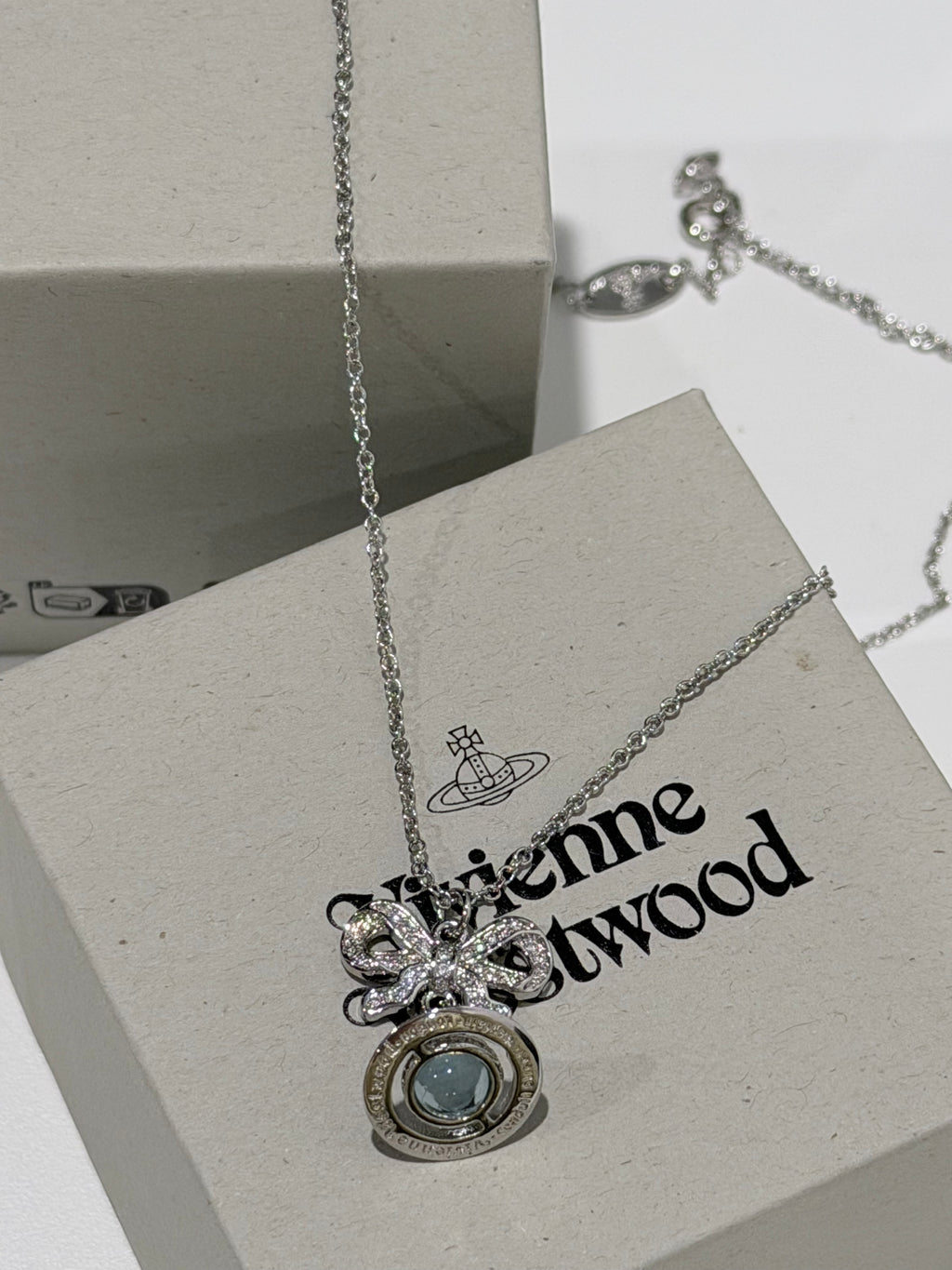 VW Ribbon Orb Pendant Necklace - Blue