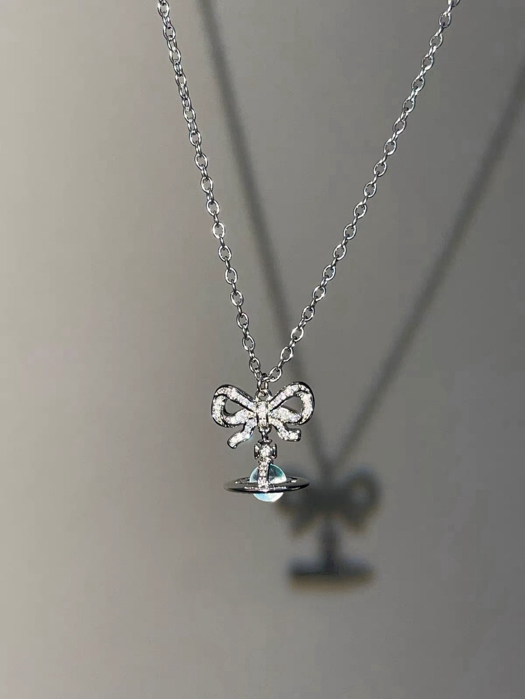 VW Ribbon Orb Pendant Necklace - Blue