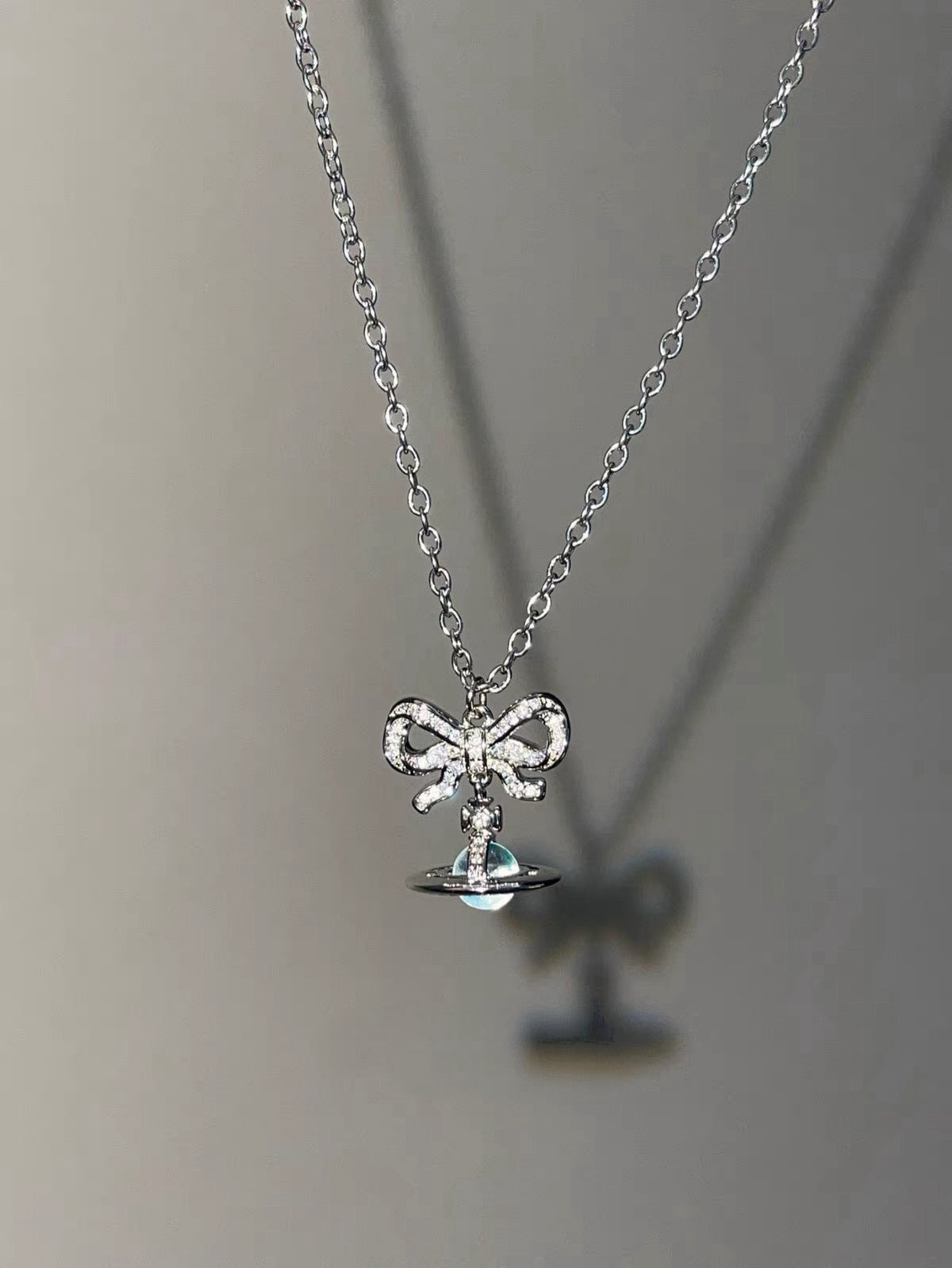 VW Ribbon Orb Pendant Necklace - Blue