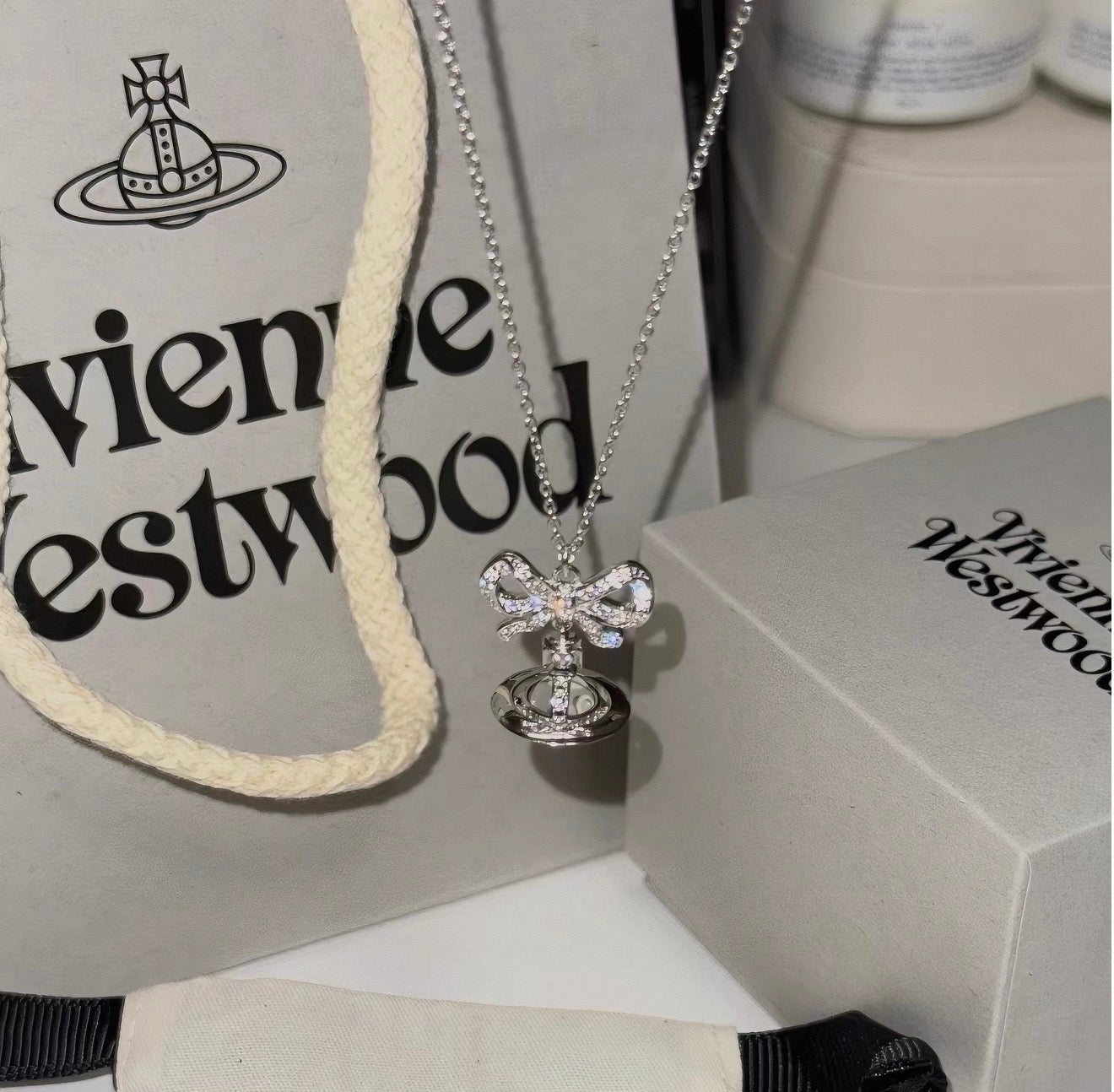 VW Ribbon Orb Pendant Necklace - Silver