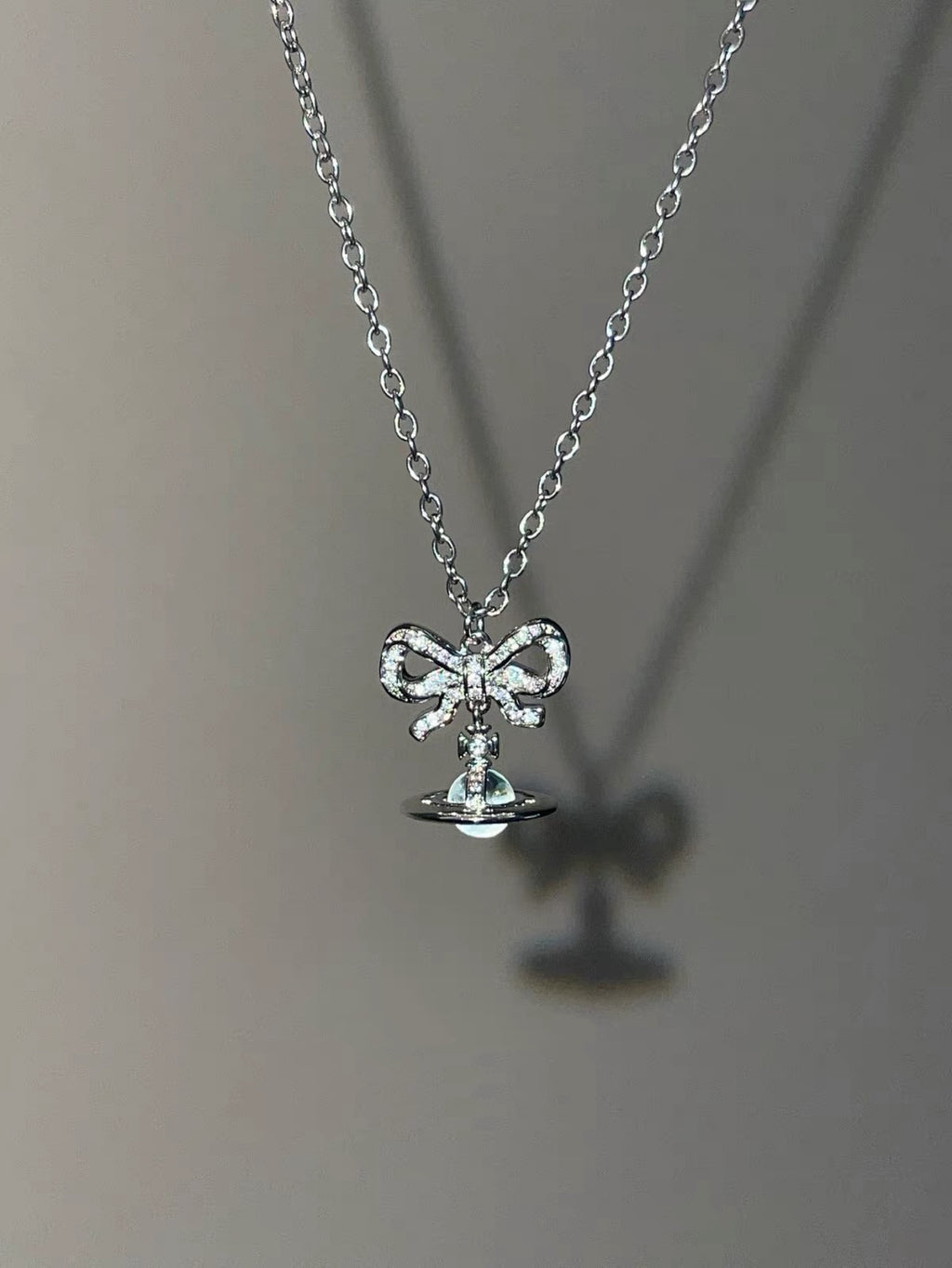 VW Ribbon Orb Pendant Necklace - Blue
