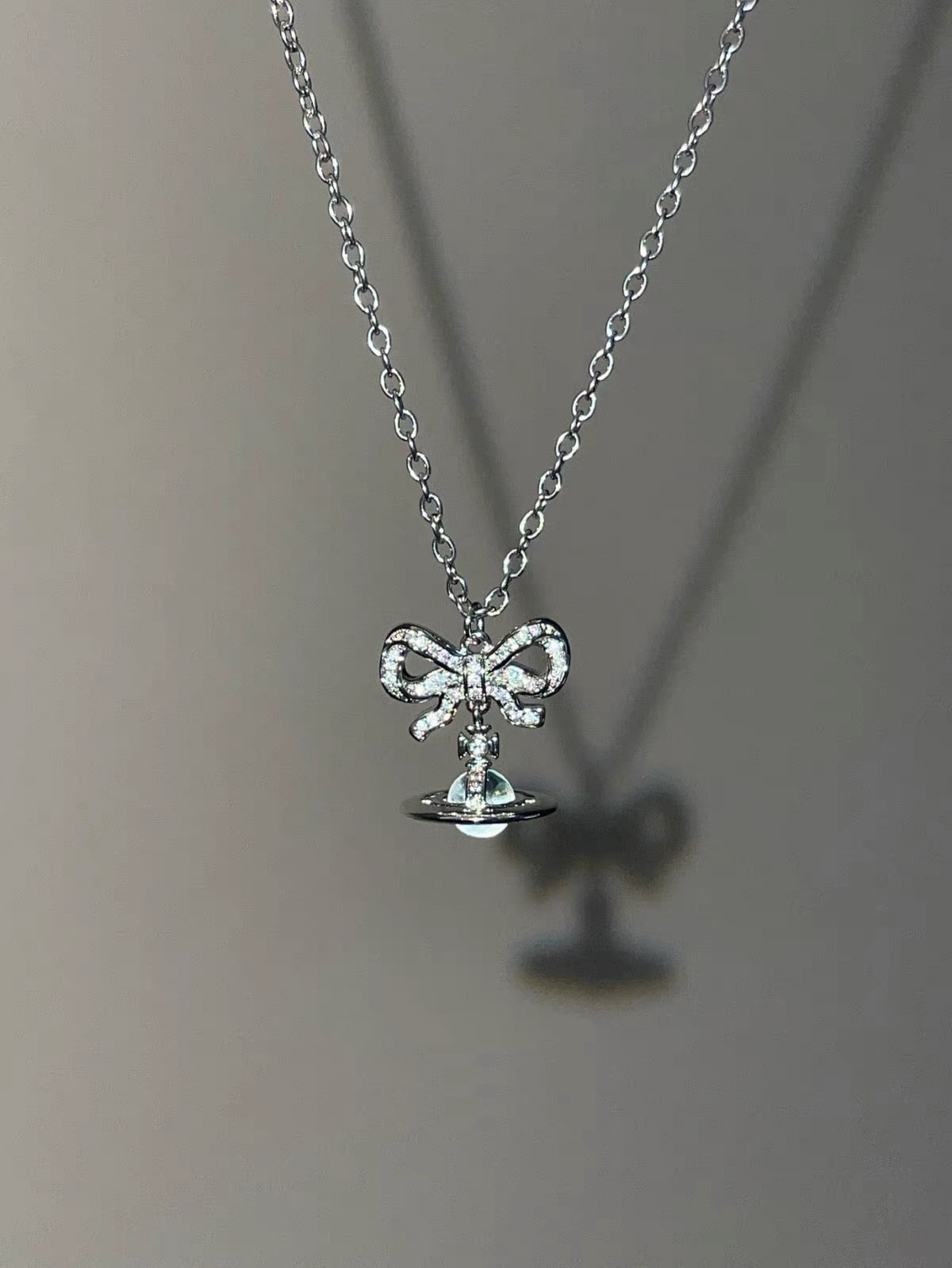 VW Ribbon Orb Pendant Necklace - Blue