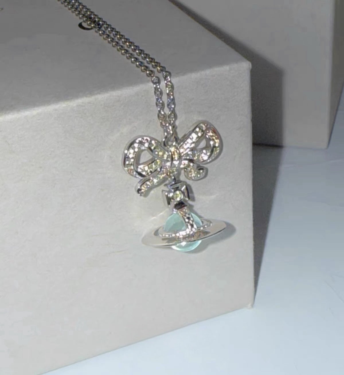 VW Ribbon Orb Pendant Necklace - Blue