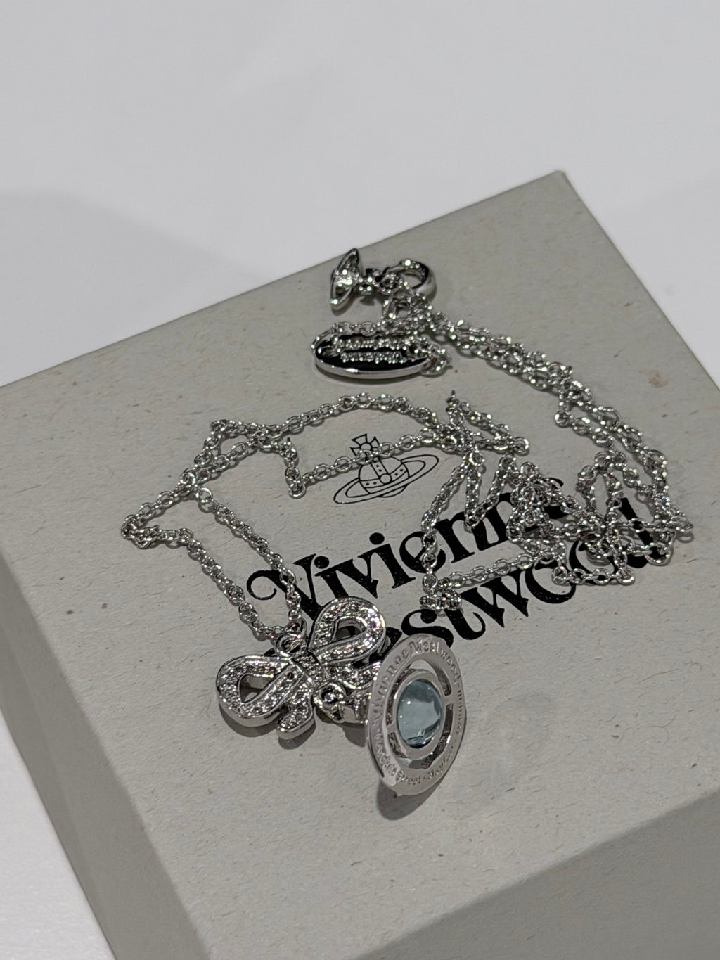 VW Ribbon Orb Pendant Necklace - Blue